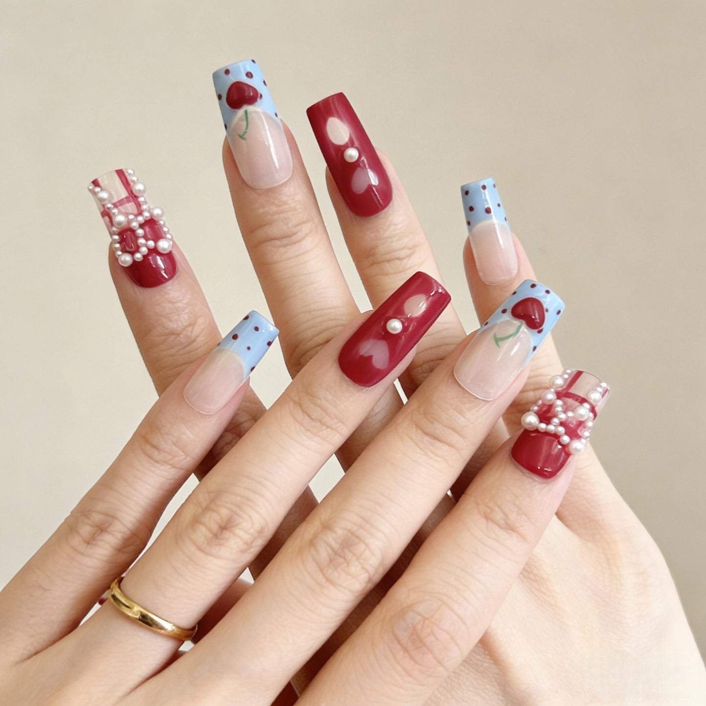 Cherry Pearl Press-On Nails - Red Blue False Nails - lifestyle view - ClouDIY UK