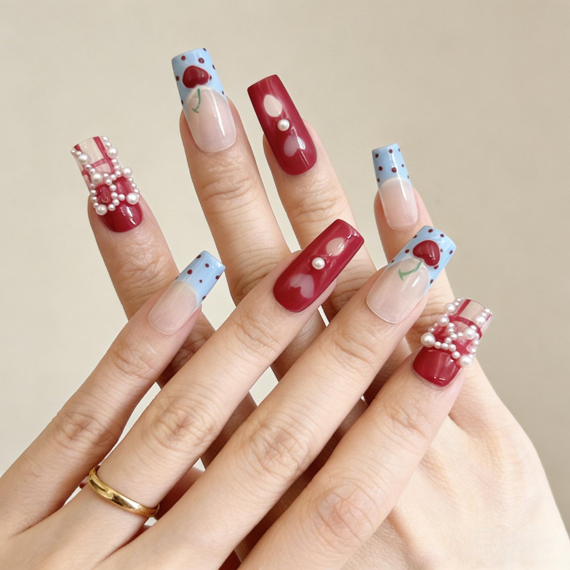 Cherry Pearl Press-On Nails - Red Blue False Nails - lifestyle view - ClouDIY UK
