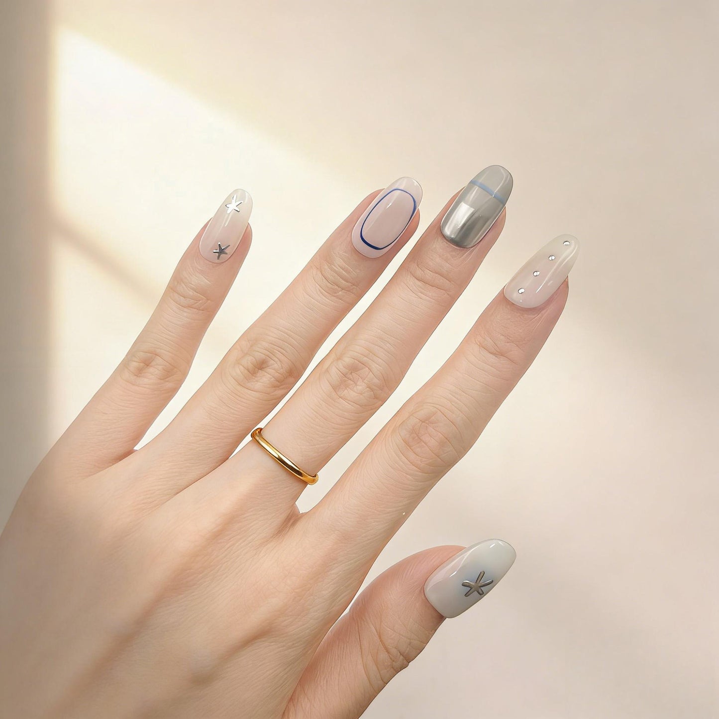 Pale Blue Star Press-On Nails - Metallic Accent False Nails - close up - ClouDIY UK