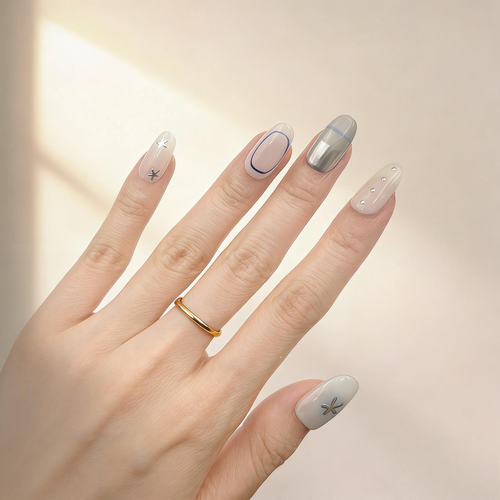 Pale Blue Star Press-On Nails - Metallic Accent False Nails - close up - ClouDIY UK