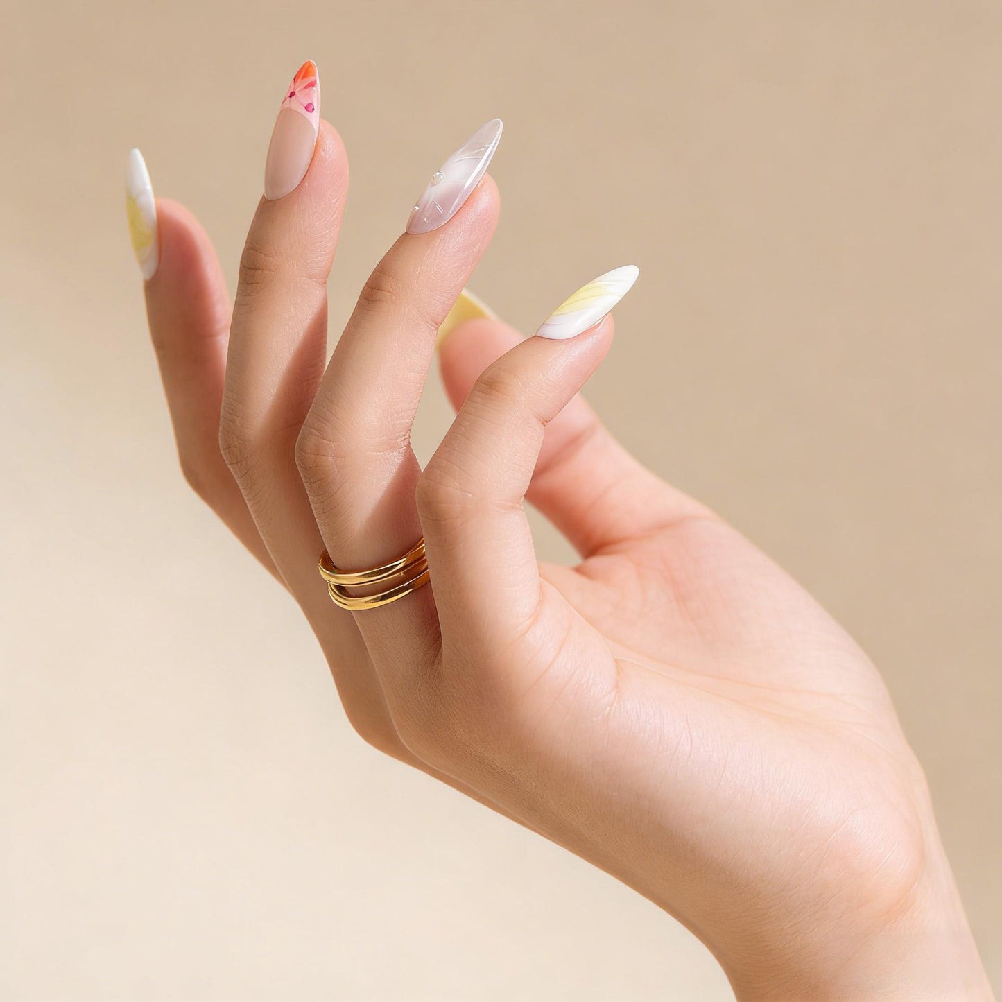 Yellow Purple Floral Press-On Nails - Pearl Accent False Nails UK - lifestyle view - ClouDIY UK