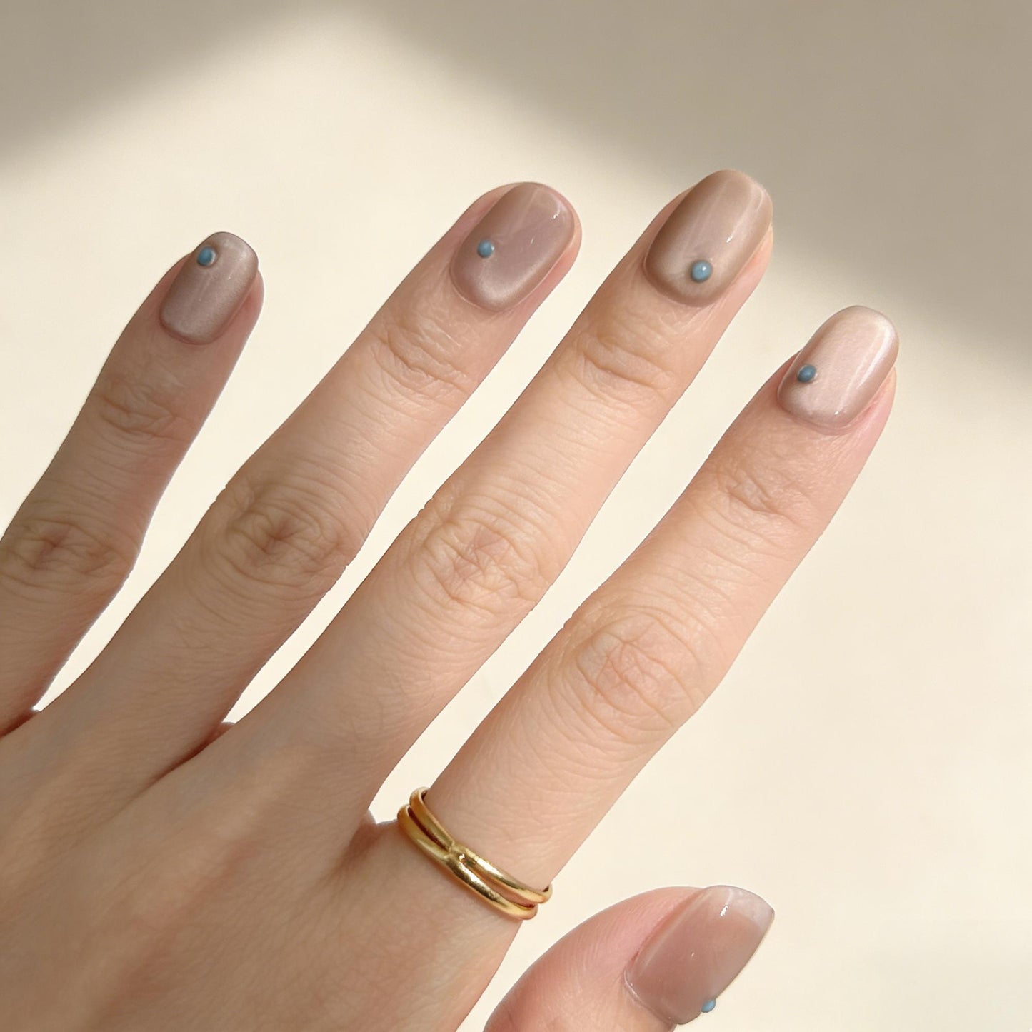 Champagne Blue Dot Press-On Nails - Minimalist False Nails UK - lifestyle view - ClouDIY UK