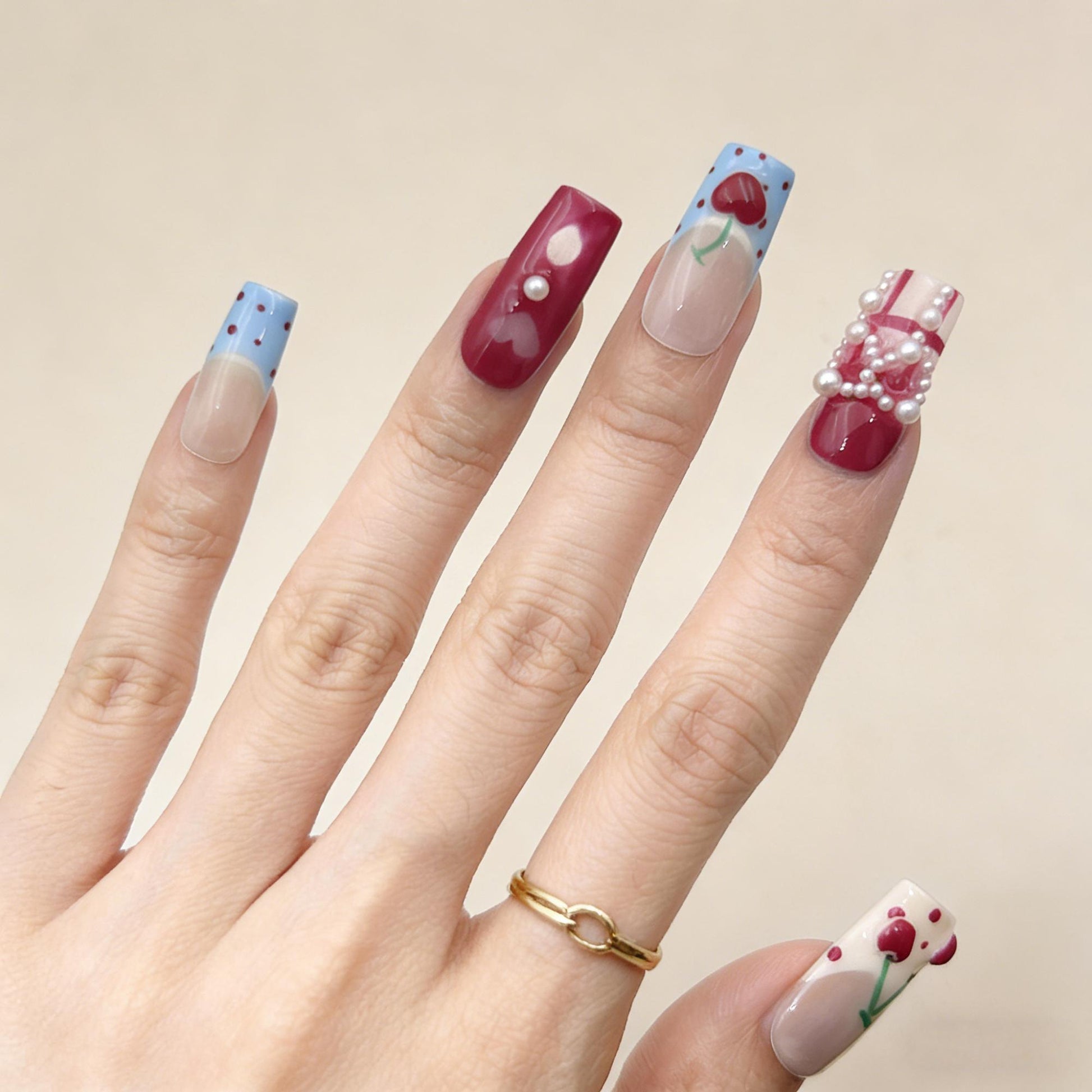 Cherry Pearl Press-On Nails - Red Blue False Nails - close up - ClouDIY UK